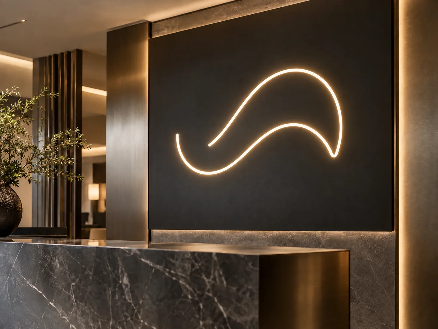 Warm luminous abstract emblem on a dark architectural sign panel