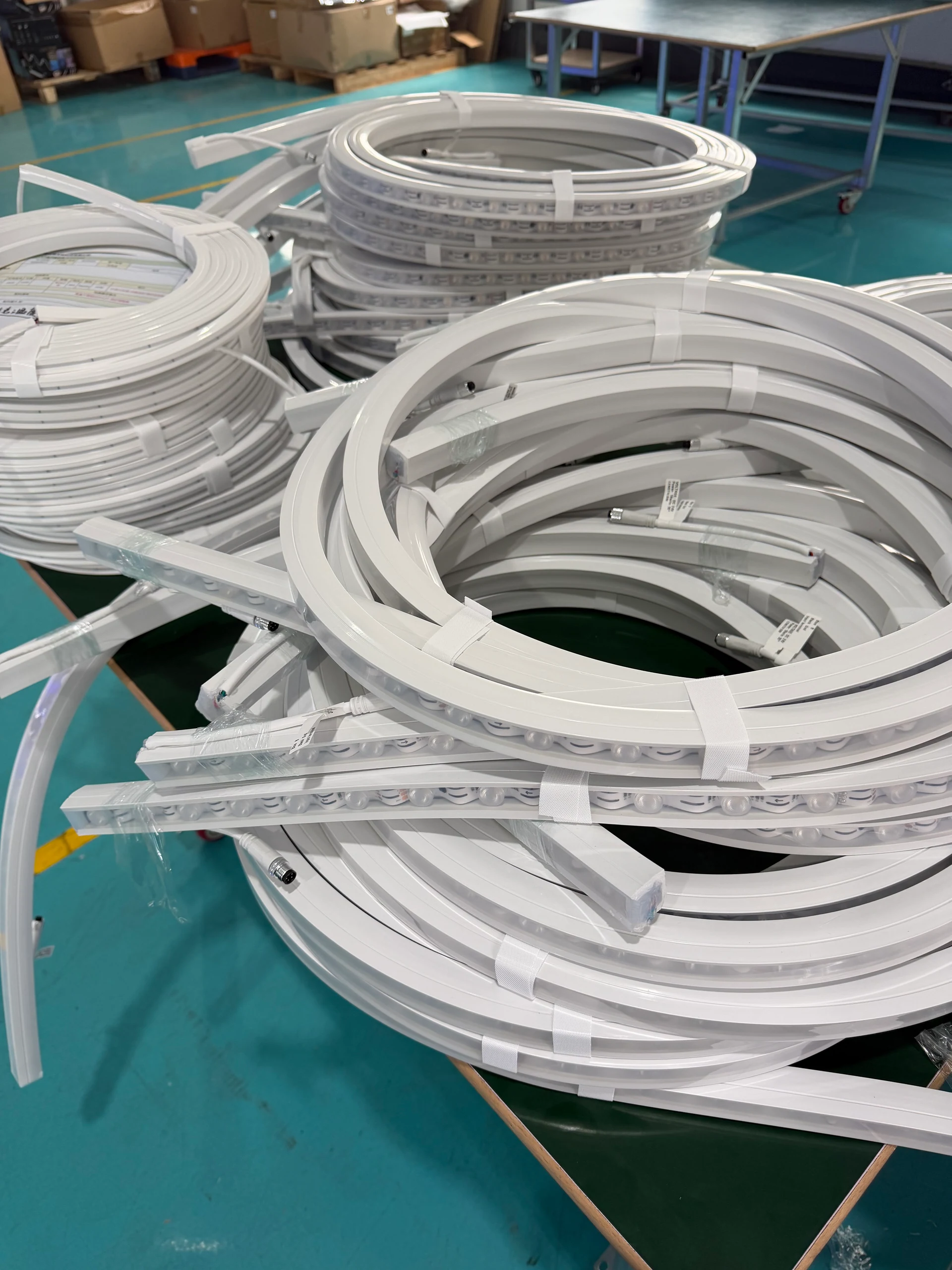 Custom silicone lighting profiles and assembled lengths prepared in the workshop