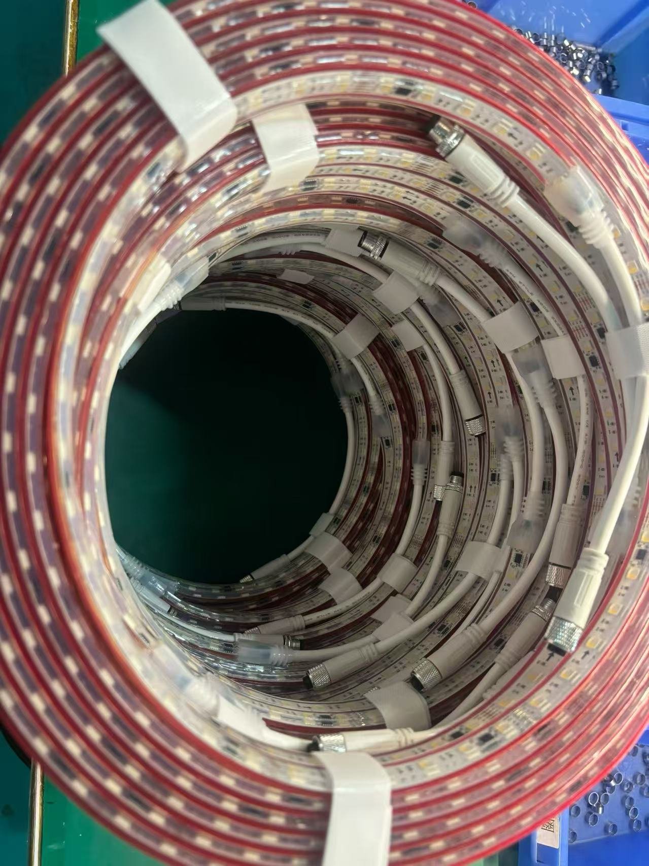 Photographed flexible LED strip assemblies with separate visible LED packages and cable ends