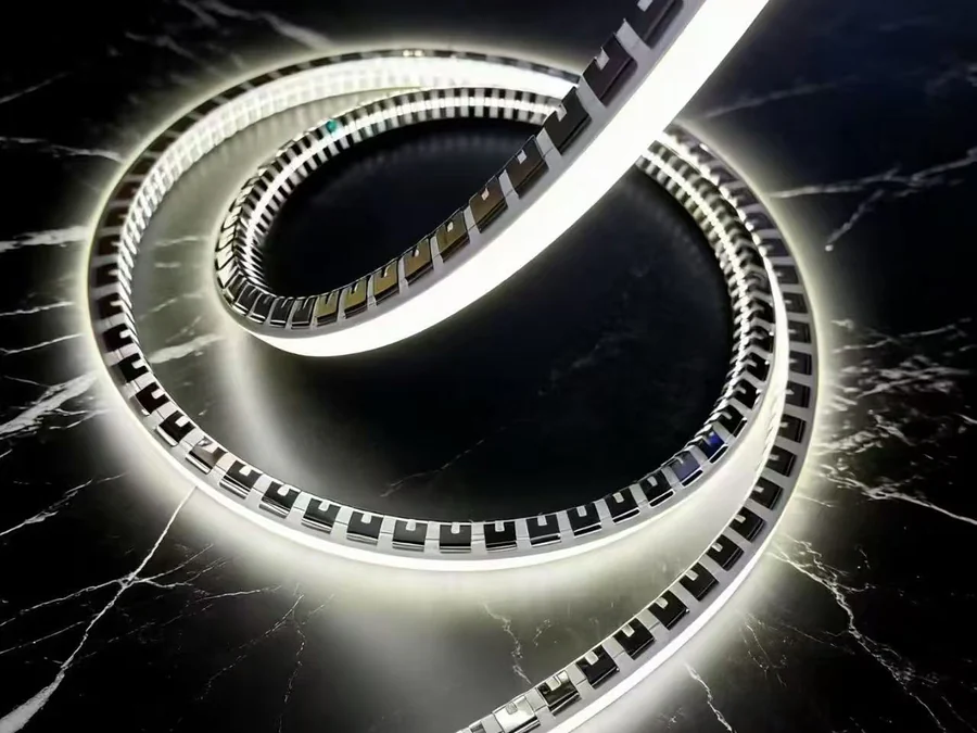 Real illuminated flexible lighting sample with a continuous white light line