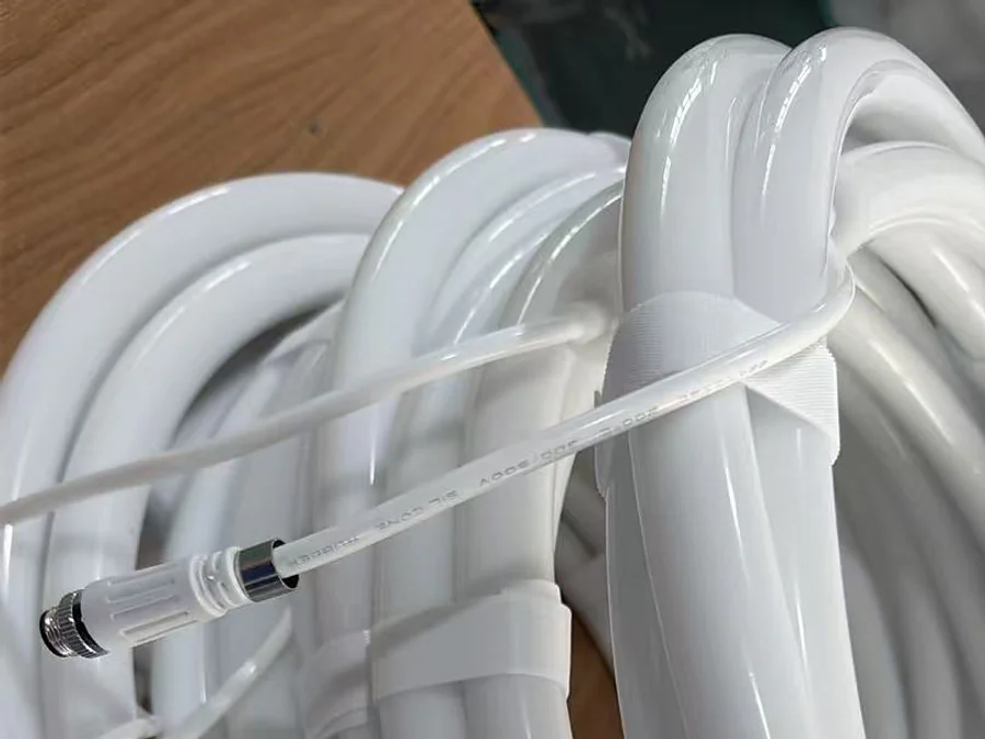 Close view of a real flexible lighting coil and cable connector